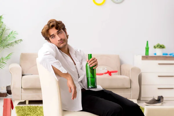 Young man having hangover after party — Stock Photo, Image