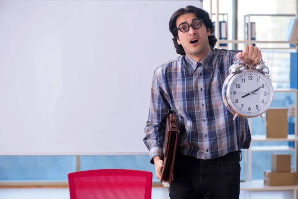 Funny male teacher in front of whiteboard — Stock Photo, Image