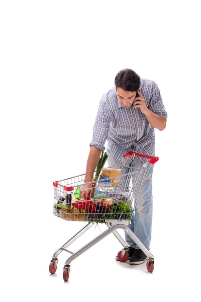 Jonge man met supermarkt kar trolley op wit — Stockfoto