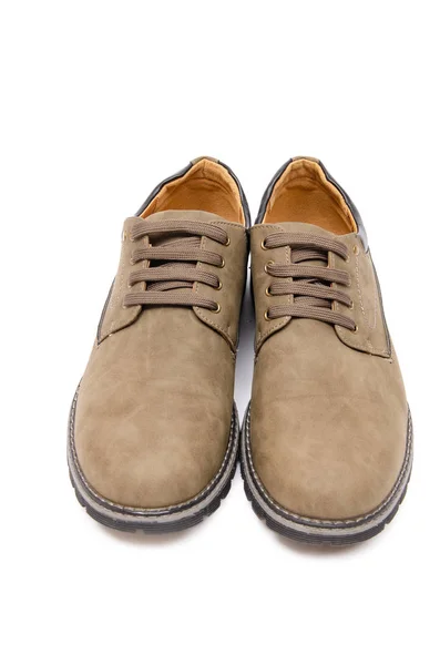 Suade brązowe buty na białym tle — Zdjęcie stockowe