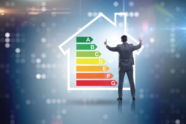 Empresario en concepto de eficiencia energética — Foto de Stock