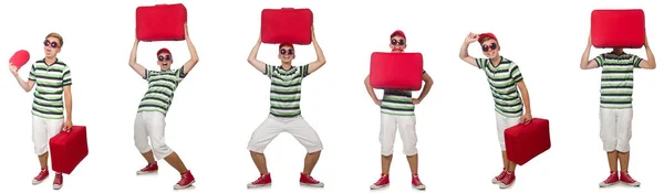 Junger Mann mit rotem Koffer isoliert auf weißem Grund — Stockfoto
