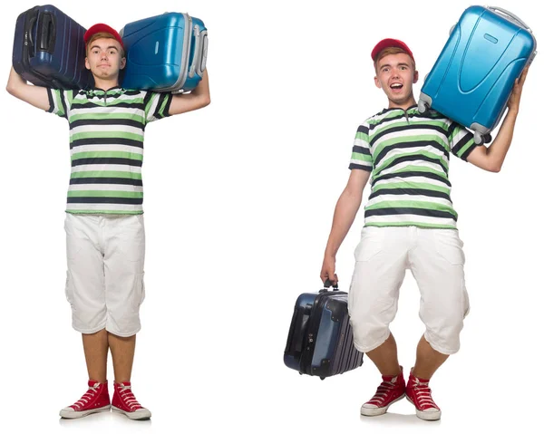 Young man with heavy suitcases isolated on white — Stock Photo, Image