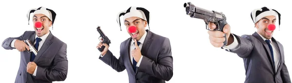 Legrační klaun podnikatel s pistole — Stock fotografie