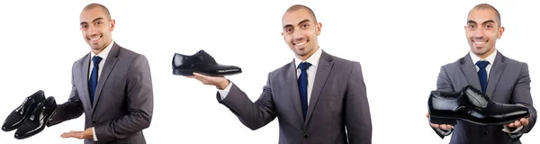 Man met schoenen geïsoleerd op wit — Stockfoto