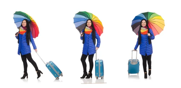 Pretty girl with suitcase and umbrella isolated on white — Stock Photo, Image