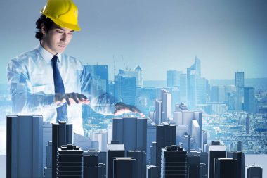 Gelecekçi mimar şehir planlaması yapıyor.