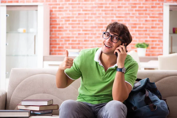 Young student preparing for exams at home — Stock Photo, Image