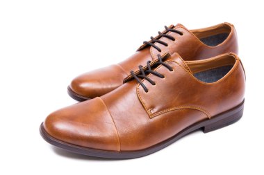 Kahverengi ayakkabılar beyaz arkaplanda izole edilmiş