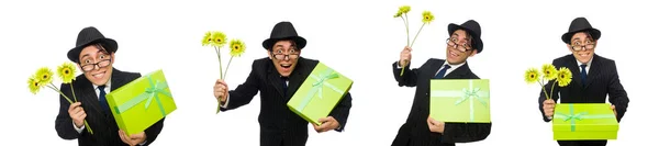 Funny man with flowers and box — Stock Photo, Image