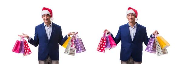 Joven con bolsos después de las compras de Navidad sobre fondo blanco —  Fotos de Stock