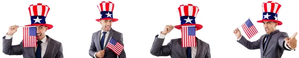 Muž s americkou kloboukem a vlajky — Stock fotografie
