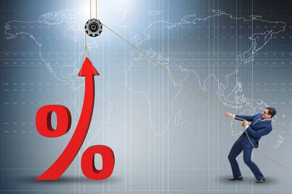 Empresario aumentando tasa de interés en el mercado — Foto de Stock