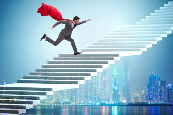 Superheld zakenman carrièreladder klimmen — Stockfoto