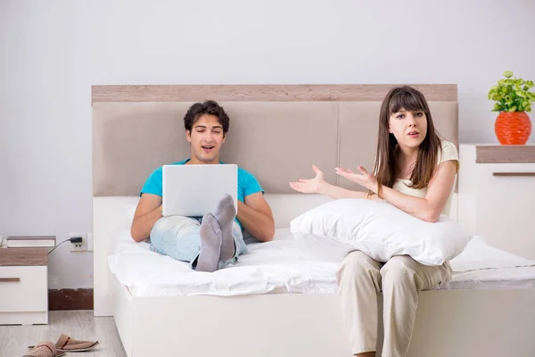 Woman feeling lonely with husband — Stock Photo, Image