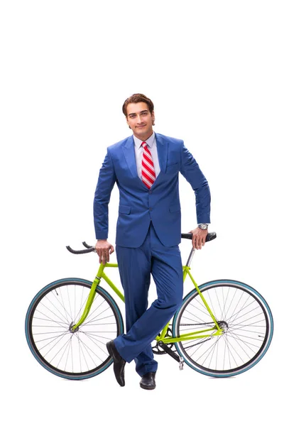 Молодой бизнесмен на велосипеде добирается до офиса — стоковое фото