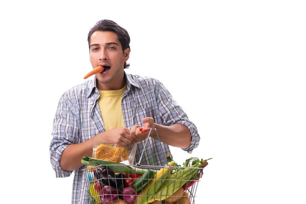 Joven con su tienda de comestibles en blanco — Foto de Stock