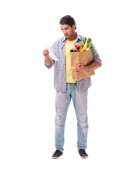 Jeune homme avec son épicerie sur blanc — Photo