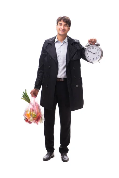 Jovem homem bonito com vegatables no conceito de compras — Fotografia de Stock