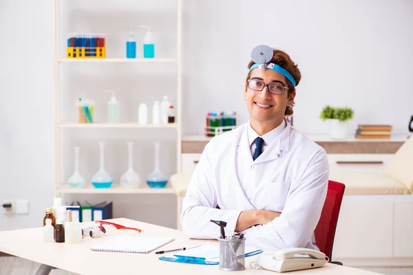 Young male doctor otolaryngologist working at the hospital — Stock Photo, Image