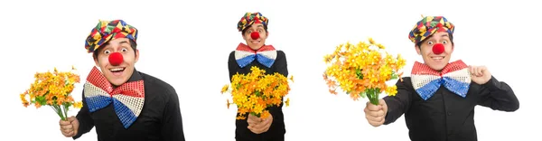 Grappige clown met bloemen geïsoleerd op wit — Stockfoto