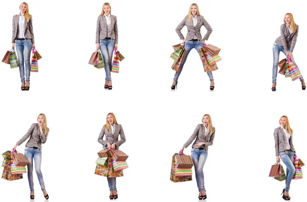Mulher bonita com sacos de compras isolados em branco — Fotografia de Stock