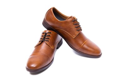 Kahverengi ayakkabılar beyaz arkaplanda izole edilmiş