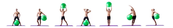 Man with swiss ball doing exercises on white — Stock Photo, Image