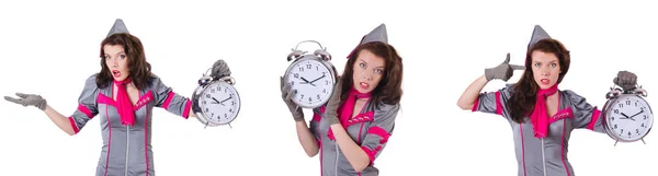 Jonge stewardess met alarm-clock in tijd management concept — Stockfoto