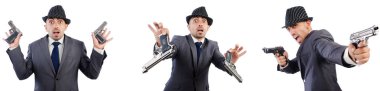 Tabanca ile takım elbiseli Genç gangster 