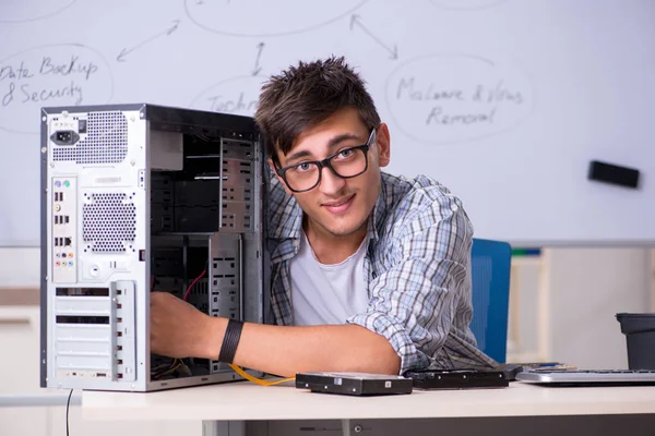 Young it specialist in front of the whiteboard — Stock Photo, Image