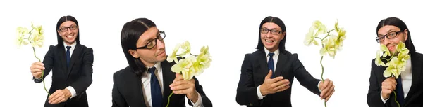 Hombre de negocios guapo con flor aislada en blanco —  Fotos de Stock