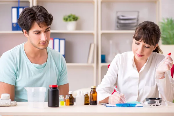 Doctor getting saliva test sample in clinic hospital — Stock Photo, Image