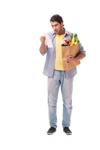 Young man with his grocery shopping on white — Stock Photo, Image