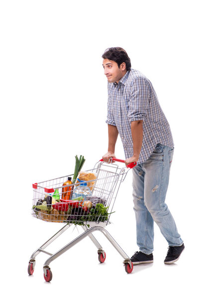 Young man with supermarket cart trolley on white