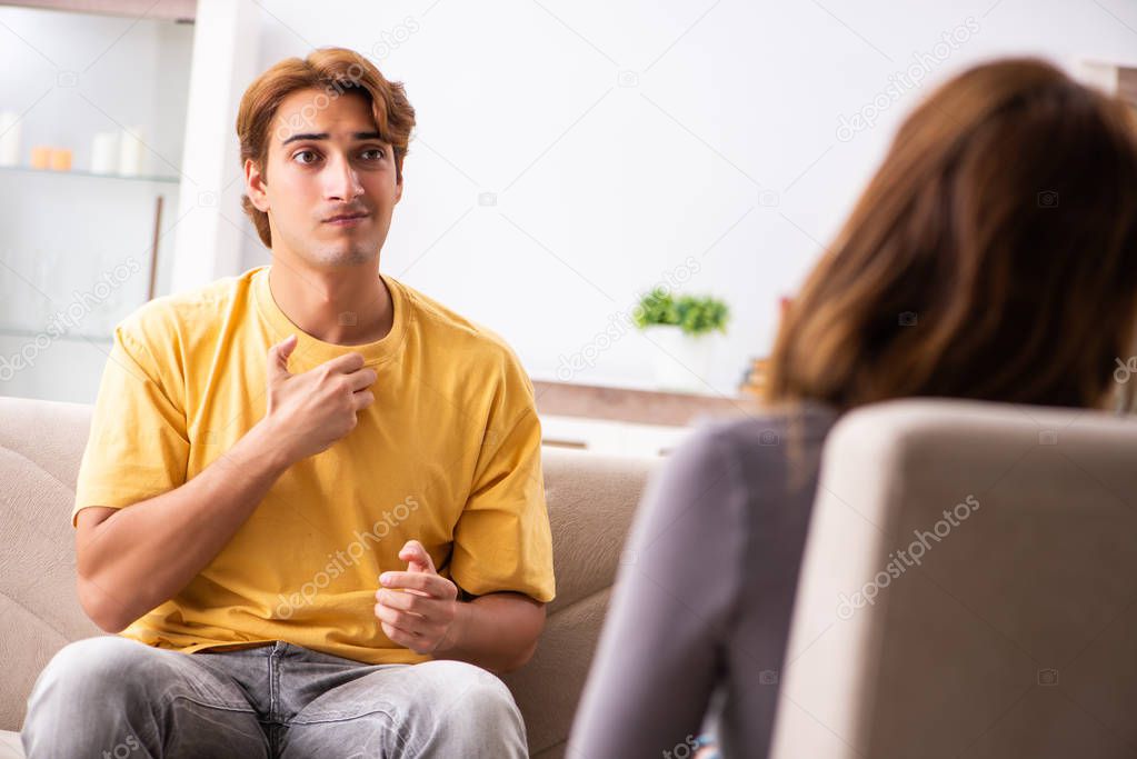 Woman and man learning sign language