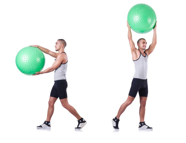 Man with swiss ball doing exercises on white — Stock Photo, Image