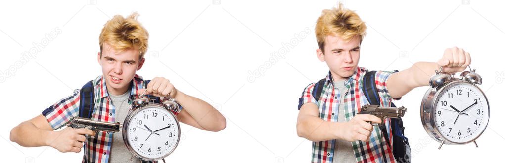 Young boy with alarm-clock and handgun