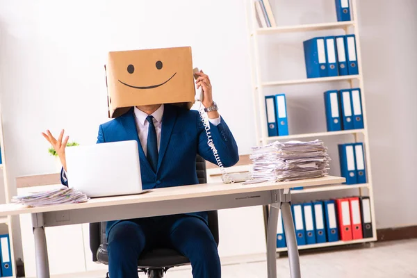 Happy man employee with box instead of his head — Stock Photo, Image