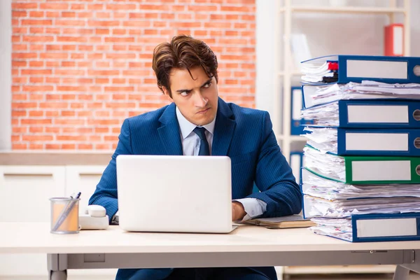 Young elegant man unhappy with too much work
