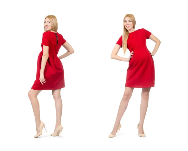 Bardzo ciąży kobieta w czerwonej sukience na białym tle — Zdjęcie stockowe