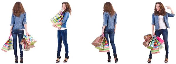 Mujer joven con bolsas aisladas en blanco —  Fotos de Stock