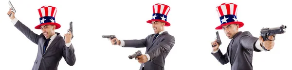 Man with american hat and handguns — Stock Photo, Image