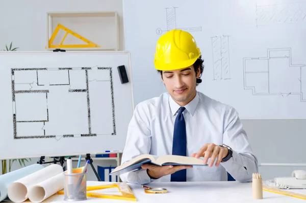 Young handsome architect working on the project — Stock Photo, Image