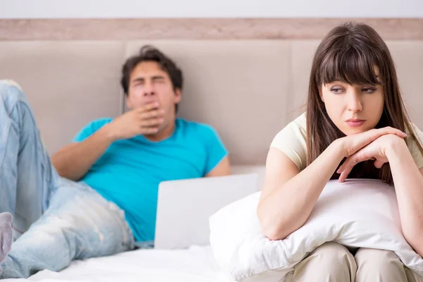 Woman feeling lonely with husband — Stock Photo, Image