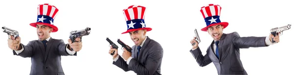 Man med amerikansk hatt och handeldvapen — Stockfoto