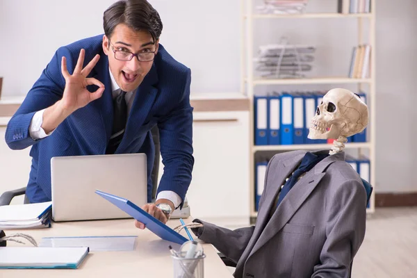 Funny business meeting with boss and skeletons