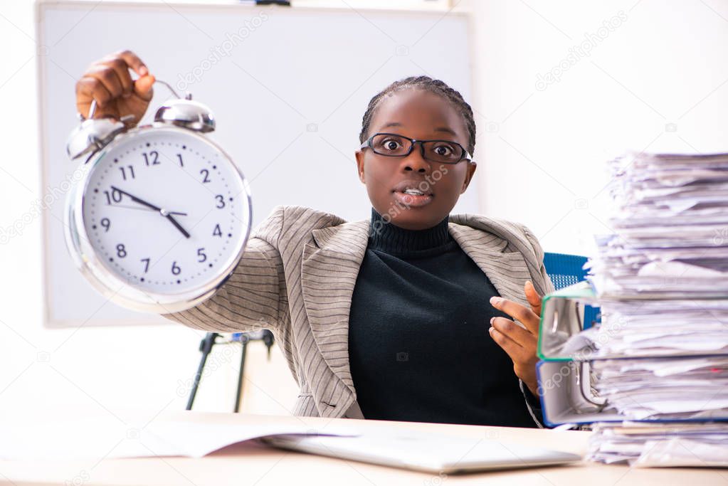 Black female employee unhappy with excessive work