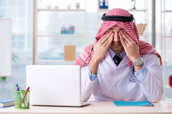 Arab doctor working in the clinic Royalty Free Stock Images