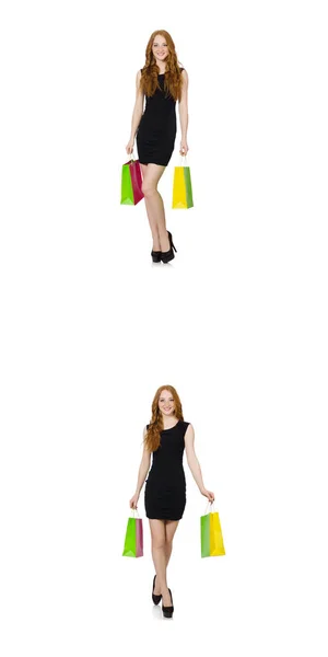 Ung kvinna wth väskor i shopaholic-konceptet — Stockfoto